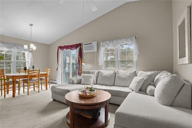 carpeted living room with an AC wall unit, ceiling fan with notable chandelier, and vaulted ceiling