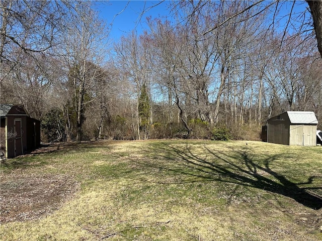 87 Elmbrook Dr, Warwick, RI 02889 - view of yard featuring a storage unit and an outdoor structure