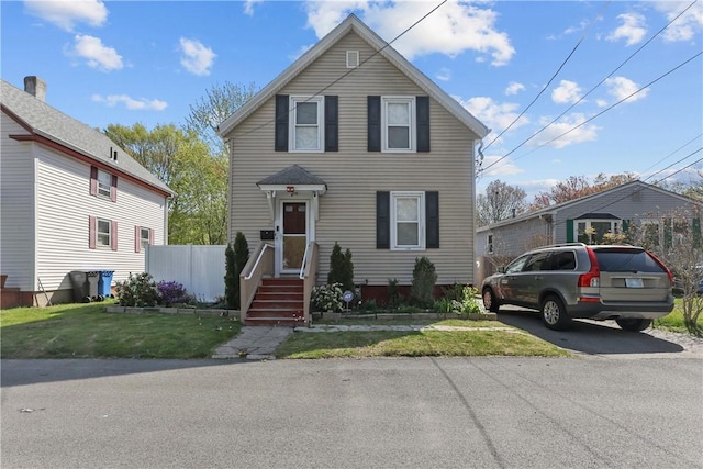 70 Perkins Ave, Cranston, RI 02910 - traditional home with fence and a front yard
