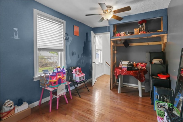 70 Perkins Ave, Cranston, RI 02910 - bedroom featuring baseboards, a ceiling fan, and wood finished floors