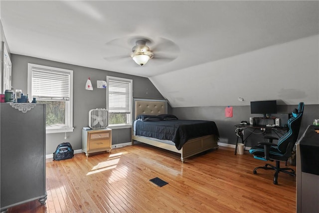 70 Perkins Ave, Cranston, RI 02910 - bedroom with light wood-style floors, baseboards, ceiling fan, and vaulted ceiling