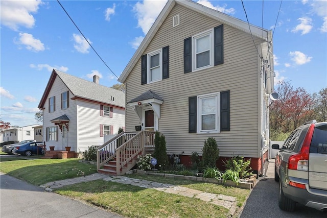 70 Perkins Ave, Cranston, RI 02910 - traditional-style home with a front yard