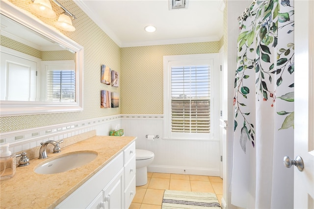 244 Spring St, Block Island, RI 02807 - bathroom featuring crown molding, tile patterned flooring, wainscoting, vanity, and toilet