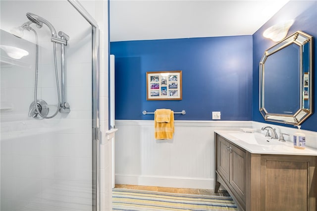 244 Spring St, Block Island, RI 02807 - bathroom featuring wainscoting, a shower stall, and vanity
