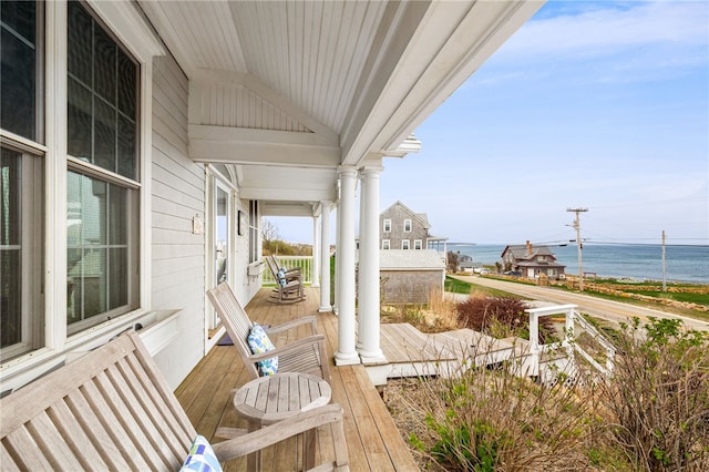 244 Spring St, Block Island, RI 02807 - balcony featuring a water view and covered porch