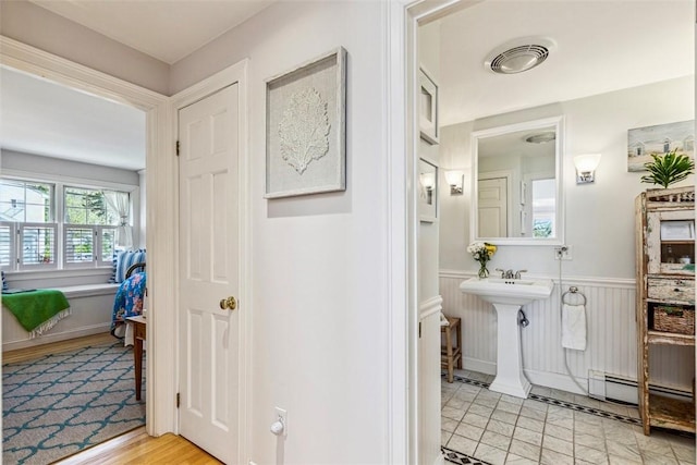 bathroom featuring visible vents and wainscoting