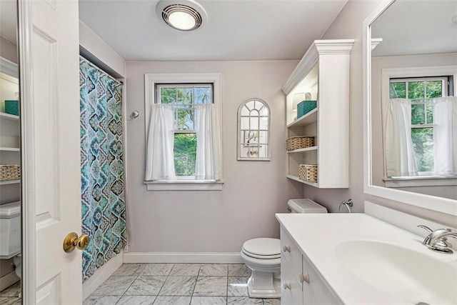 bathroom featuring visible vents, baseboards, vanity, toilet, and marble finish floor