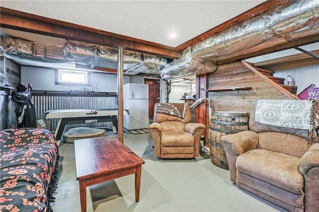 interior space with stairs and finished concrete flooring