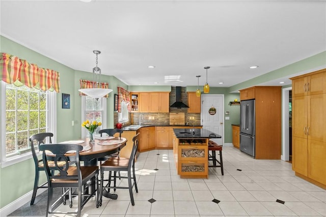 dining space with baseboards, recessed lighting, and light tile patterned flooring