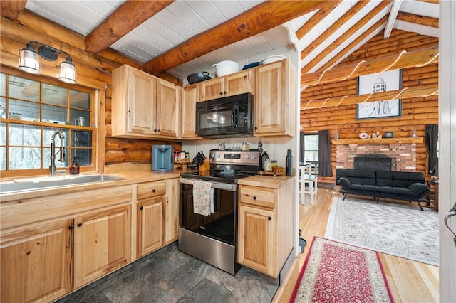 kitchen featuring light brown cabinetry, beam ceiling, black microwave, a sink, and stainless steel electric range oven