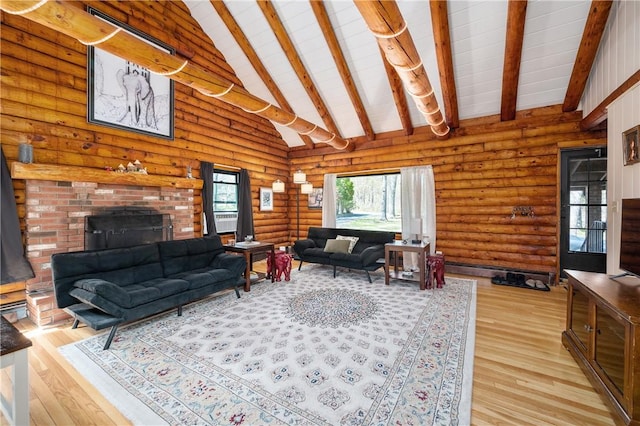 living area featuring a fireplace, light wood-type flooring, high vaulted ceiling, rustic walls, and beamed ceiling