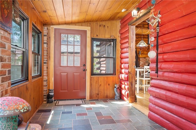 doorway to property featuring a porch