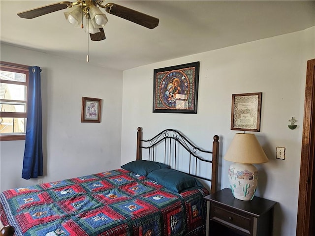 bedroom featuring ceiling fan