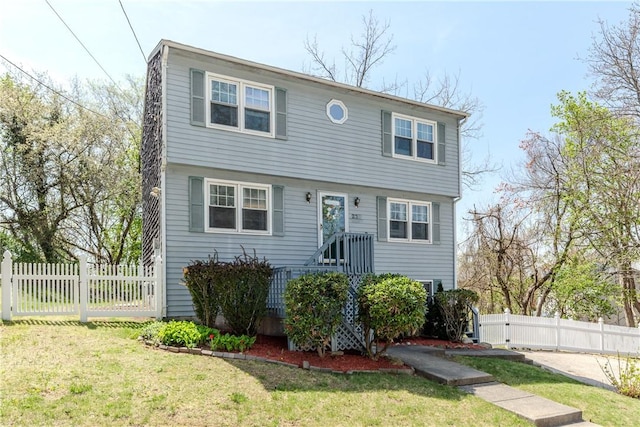 23 Oak Grove Blvd, North Providence, RI 02911 - colonial house with fence and a front lawn