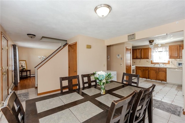 23 Oak Grove Blvd, North Providence, RI 02911 - dining area featuring visible vents, a baseboard radiator, stairway, a ceiling fan, and light tile patterned floors