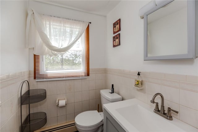23 Oak Grove Blvd, North Providence, RI 02911 - bathroom with vanity, a baseboard radiator, toilet, and tile walls