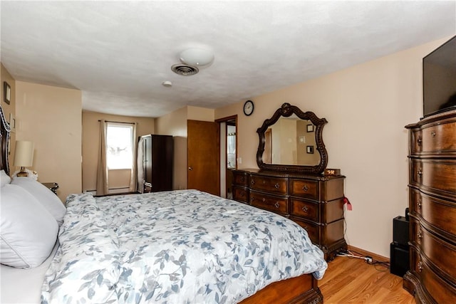23 Oak Grove Blvd, North Providence, RI 02911 - bedroom with visible vents, light wood finished floors, and baseboards