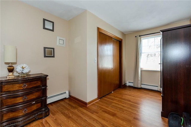 23 Oak Grove Blvd, North Providence, RI 02911 - interior space featuring baseboards, wood finished floors, and baseboard heating