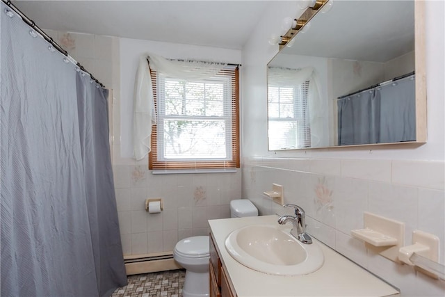 23 Oak Grove Blvd, North Providence, RI 02911 - bathroom featuring baseboard heating, vanity, toilet, a shower with shower curtain, and tile walls