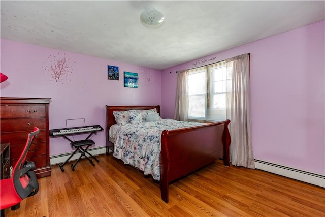 23 Oak Grove Blvd, North Providence, RI 02911 - bedroom with a baseboard radiator and light wood-style flooring