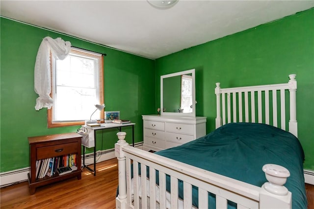 23 Oak Grove Blvd, North Providence, RI 02911 - bedroom with wood finished floors and baseboard heating