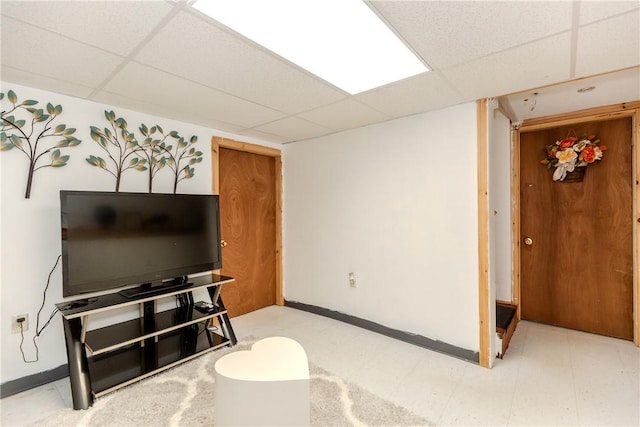 23 Oak Grove Blvd, North Providence, RI 02911 - living room featuring baseboards, a drop ceiling, and light floors