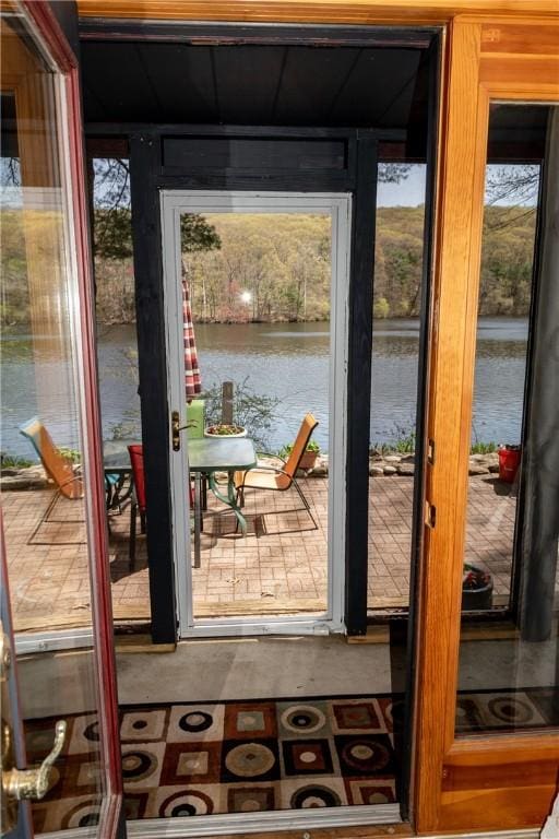 doorway featuring a water view