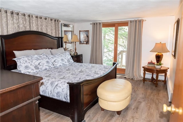 bedroom with wood finished floors