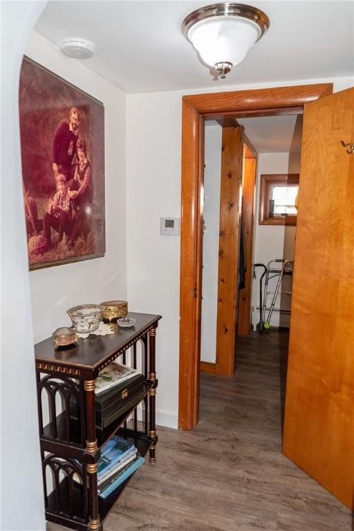 corridor with wood finished floors