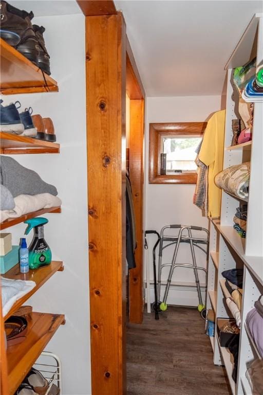 storage room featuring a baseboard heating unit