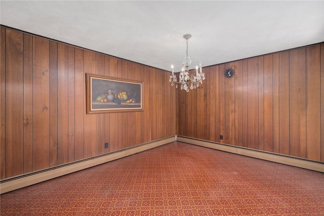49 Magnolia Ln, Coventry, RI 02816 - empty room featuring wood walls and a chandelier
