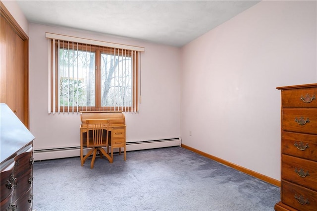 interior space with baseboards, carpet, and a baseboard heating unit