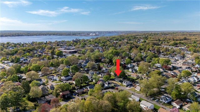 bird's eye view featuring a water view and a residential view