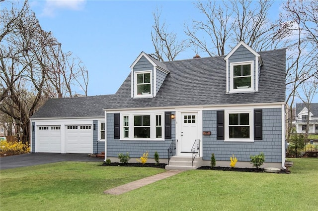 cape cod home with a garage, a front lawn, roof with shingles, and aphalt driveway