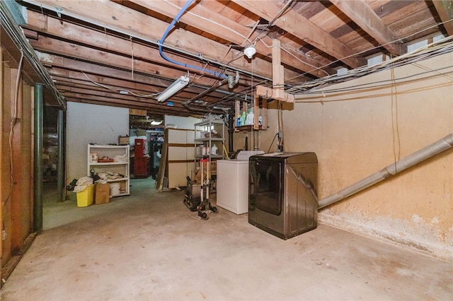 unfinished basement featuring washer and dryer
