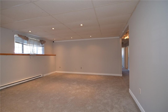 300 Smithfield Rd Unit P1-1, Providence, RI 02904 - below grade area with baseboards, a baseboard radiator, carpet, and a drop ceiling