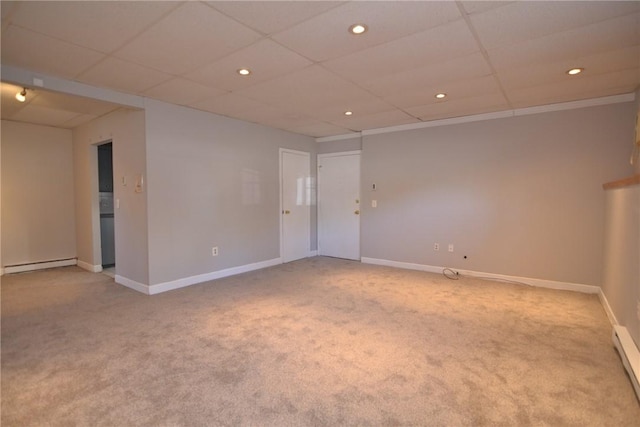 300 Smithfield Rd Unit P1-1, Providence, RI 02904 - spare room featuring a drop ceiling, light carpet, and a baseboard radiator