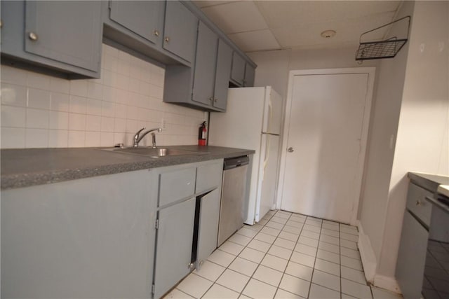 300 Smithfield Rd Unit P1-1, Providence, RI 02904 - kitchen featuring dark countertops, tasteful backsplash, dishwasher, a sink, and gray cabinetry