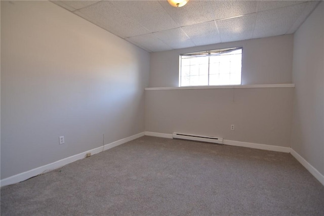 300 Smithfield Rd Unit P1-1, Providence, RI 02904 - carpeted empty room featuring baseboards, a baseboard radiator, and a drop ceiling