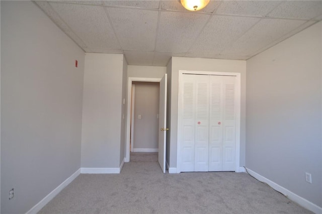 300 Smithfield Rd Unit P1-1, Providence, RI 02904 - unfurnished bedroom with a closet, carpet flooring, baseboards, and a drop ceiling