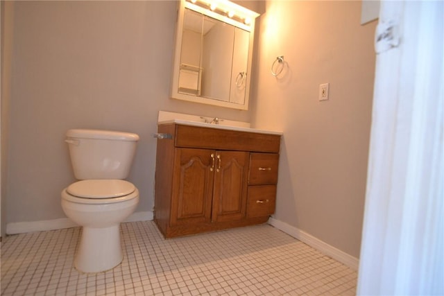 300 Smithfield Rd Unit P1-1, Providence, RI 02904 - half bathroom with baseboards, toilet, and vanity