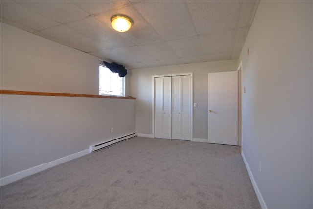 300 Smithfield Rd Unit P1-1, Providence, RI 02904 - interior space featuring carpet, baseboard heating, a closet, and a paneled ceiling
