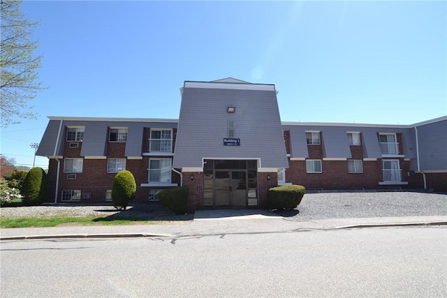 300 Smithfield Rd Unit P1-1, Providence, RI 02904 - view of building exterior featuring an attached garage