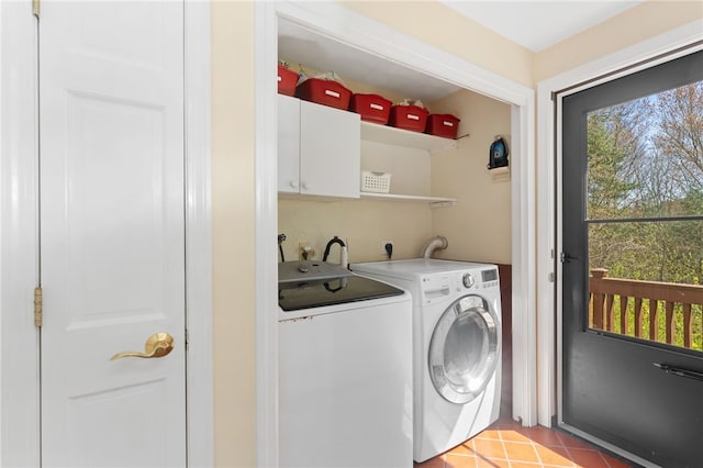 29 Howard Ave, Scituate, RI 02831 - clothes washing area featuring cabinet space, light tile patterned floors, and washing machine and clothes dryer