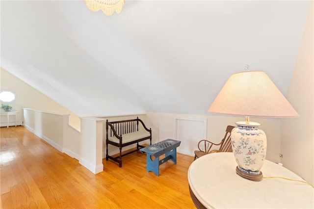 29 Howard Ave, Scituate, RI 02831 - sitting room featuring light wood-style floors, baseboards, and lofted ceiling