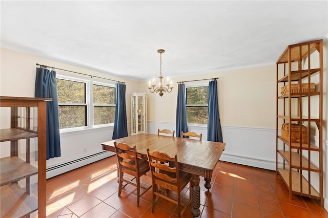 29 Howard Ave, Scituate, RI 02831 - dining area with baseboard heating, tile patterned floors, a chandelier, and a healthy amount of sunlight