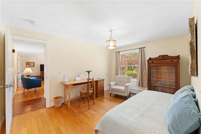 29 Howard Ave, Scituate, RI 02831 - bedroom featuring a baseboard radiator and light wood finished floors