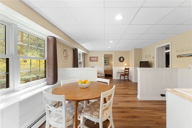 29 Howard Ave, Scituate, RI 02831 - dining room featuring wood finished floors, recessed lighting, a paneled ceiling, and a wainscoted wall