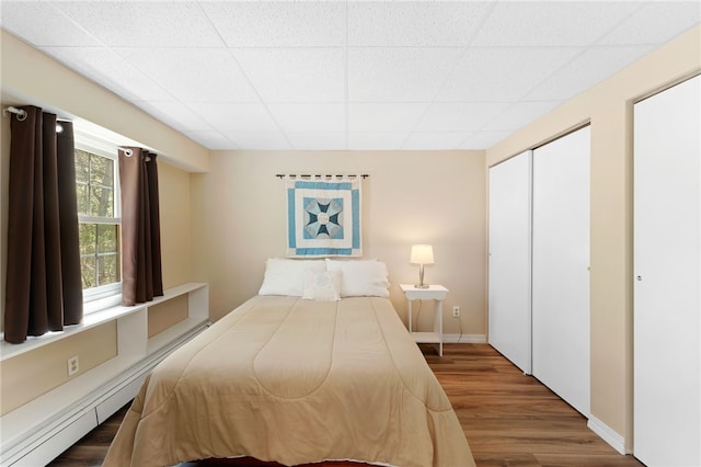 29 Howard Ave, Scituate, RI 02831 - bedroom with a drop ceiling, wood finished floors, and a closet