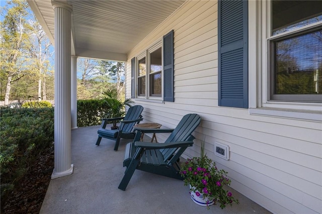 view of patio featuring a porch